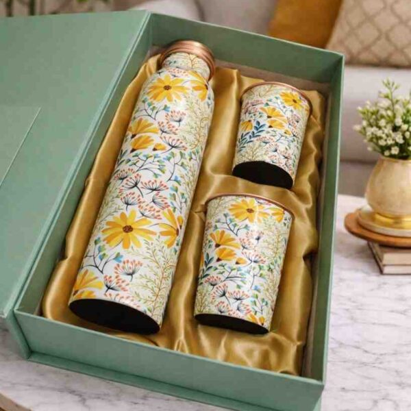 Copper water bottle set with two glasses in luxury gift packaging