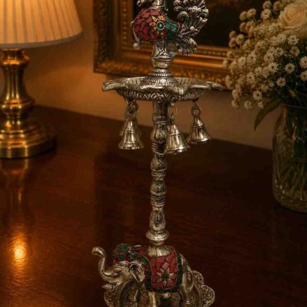 Decorative German silver diya stand with hanging bells