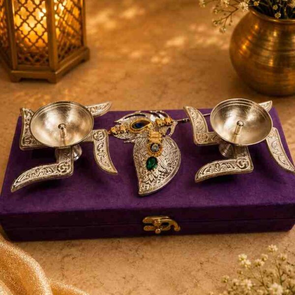 Premium German Silver Pooja Gift Set with Swastik Diyas, Chopra and Peacock Feather Decoration
